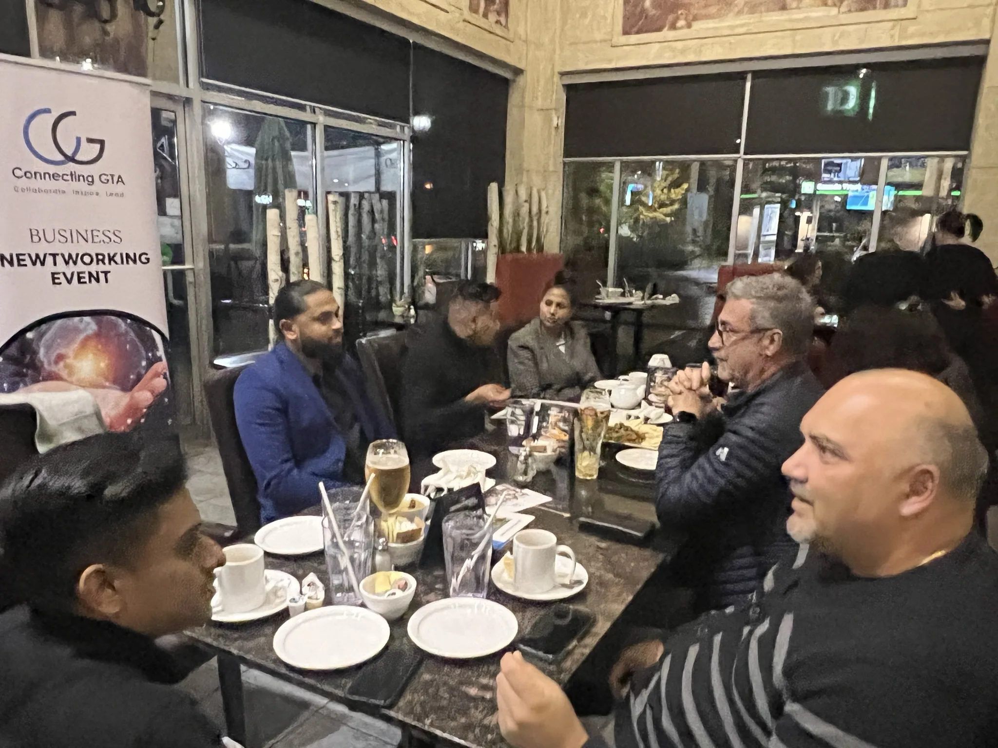 Networking Event at Symposium Cafe Restaurant & Lounge 5