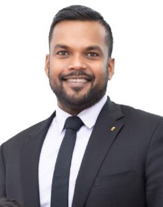 Chen headshot e1765230769741